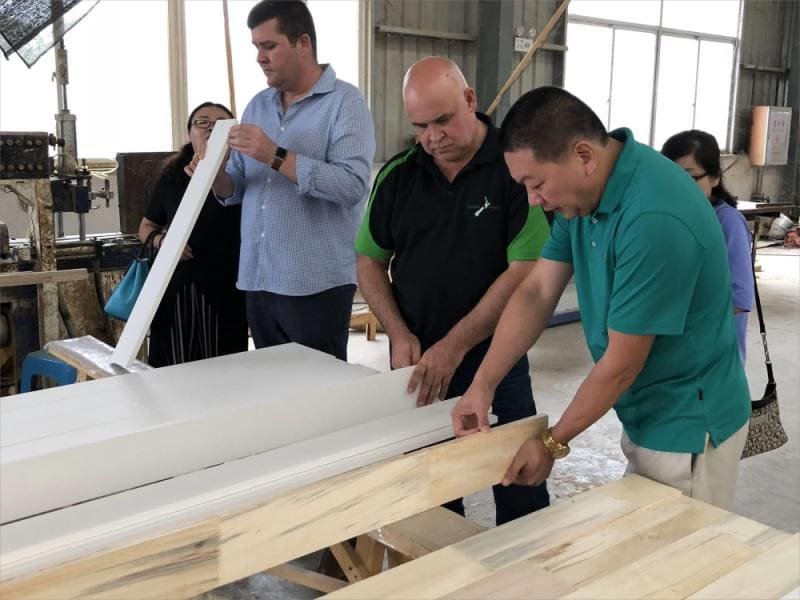 Door manufacturing facility with CNC equipment