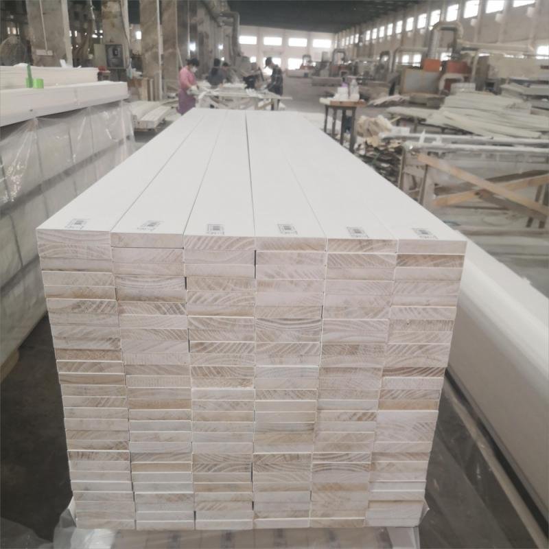 Multi-family housing construction site with installed trim and moulding