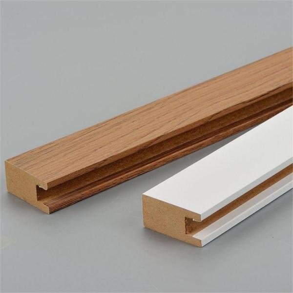 Veneer wrapped wood moulding with grain matching