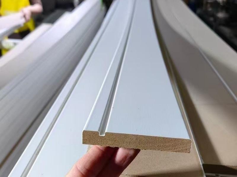 Side-by-side comparison of routed MDF edges showing crisp definition on high-density board versus visible fuzzing on standard-density board at a curved profile detail